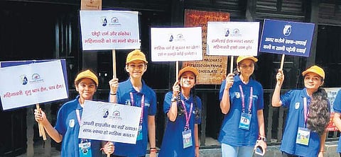 Students holding placards about sanitation on last year’s World Toilet Day at Sulabh International
