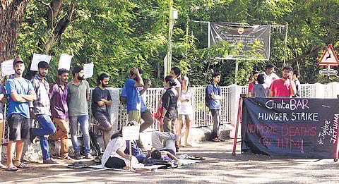 Azhar and Justin, students from Humanities and Social Science department of IIT-M sit on hunger strike demanding internal probe into 19 year old Fathima Latheef case,  who committed suicide, at IIT-M in Chennai on Monday | DEBADATTA MALLLICK