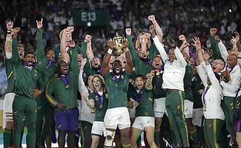 South African captain Siya Kolisi holds the Webb Ellis Cup aloft after South Africa defeated England to win the Rugby World Cup final at International Yokohama Stadium in Yokohama, Japan. (Photo | AP)