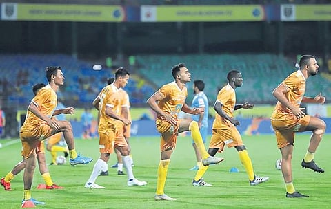 Kerala Blasters players during a training session in Hyderabad on Friday