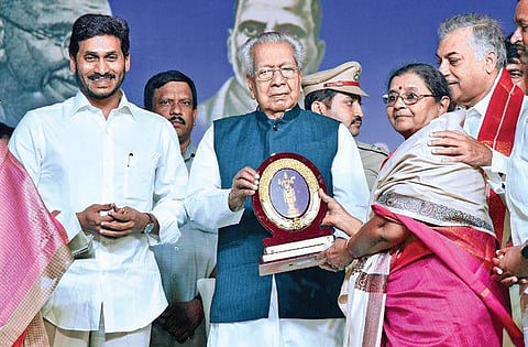 AP CM YS Jagan Mohan Reddy, along with Governer Biswabusan Harichandan, felicitating Revati, the granddaughter of Potti Sreeramulu on the occasion of AP State Formation Day at IGMC stadium in Vijayawada on Friday