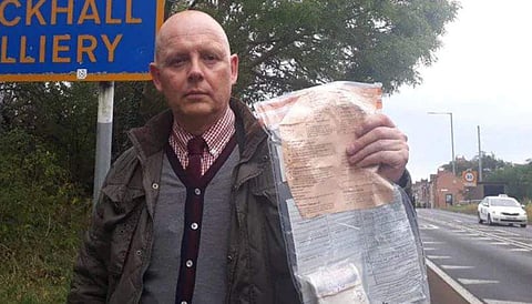 Bundles of cash keep turning up in the streets of the village. (Twitter)