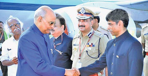 President Ram Nath Kovind being received by Kannur District Collector T V Subhash at Kannur on Tuesday