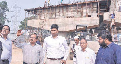 Krishna collector A Md Imtiaz, NH officials and SOMA company representatives inspecting the construction activity at Kanaka Durga flyover| Express