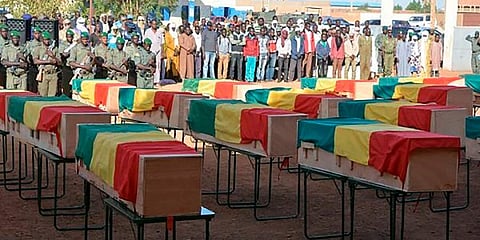 In this photo made available from the Mali Army, showing coffins being honoured at a funeral ceremony in Gao, Mali. (Photo | AP)