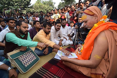 Swami Avimukteshwaranand met the protestors on Thursday noon to express his support to their demand. (Photo | Express)