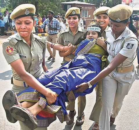 A woman activist of NNKS being taken into custody on Thursday | Express