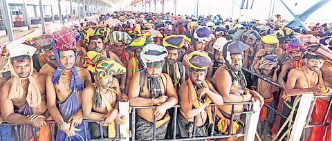 Pilgrims stranded at the valiya- nadapandal at Sabarimala Lord Ayyappa temple on Thursday. (Photo | Shaji Vettipuram, EPS)