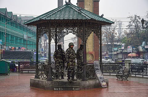 Security personnel stand guard at Lal Chowk during shutdown in Srinagar Thursday Nov. 21 2019. (Photo | PTI)