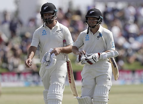New Zealand batsmen Colin de Grandhomme, left, and BJ Watling walk from the field at tea. (Photo | AP)