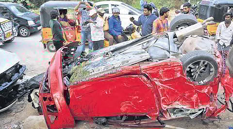The mangled remains of the car that fell off Biodiversity flyover on Saturday. (Photo | S Senabgapandiyan)