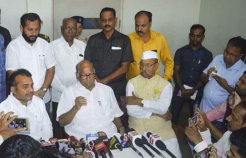 NCP President Sharad Pawar interacts with the media over the Maharashtra government formation issue in Karad Monday. (Photo | PTI)