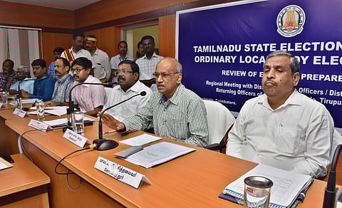 TN Election Commissioner R Palanisamy (SR) reviewing the preparedness for the coming local body elections in four districts at Coimbatore Collectorate on Tuesday. (Photo | U Rakesh Kumar, EPS)