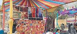 The mela is an occasion for the people of the basti to enjoy themselves
