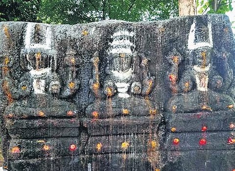 Statues of the Hindu Trinity gods and lord Aiyanar, reportedly dating back to the 13th century, found at Pidagam village along Thenpennai river in Villupuram recently | express