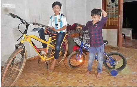 Mohammed Abir and brother Shifad with their repaired bicycles | EXPRESS