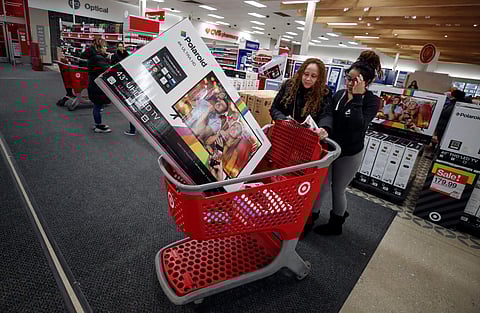 Customers shop during the Black Friday sales event on Thanksgiving Day (File photo|Reuters)