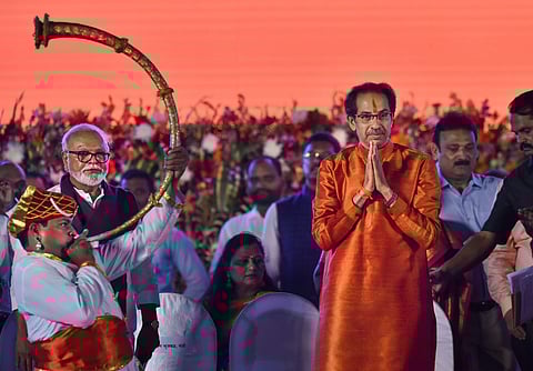 Shiv Sena President Uddhav Thackeray greets supporters during his swearing-in ceremony as the 18th Chief Minister of Maharashtra at Mumbai's Shivaji Park (Photo | PTI)