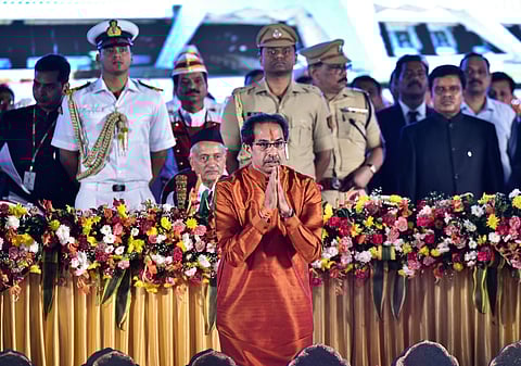 Shiv Sena President Uddhav Thackeray greets supporters during his swearing-in ceremony as the 18th Chief Minister of Maharashtra. (Photo | PTI)