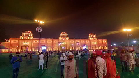 Devotees at a pandal which is a replica of 'Nankana Sahib Gurdwara' of Pakistan, in Sultanpur Lodhi to mark the 550th birth anniversary of Guru Nanak. (Photo | Express)