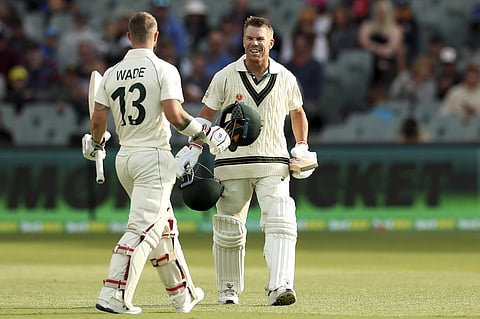 Australia's David Warner celebrates his record 335 not out during their cricket test match against Pakistan in Adelaide. (Photo | AP)