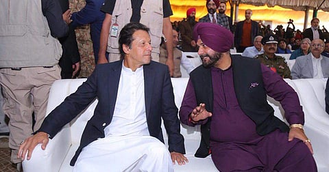 Pakistan PM Imran Khan with Congress leader Navjot Singh Sidhu. (Photo| Twitter)