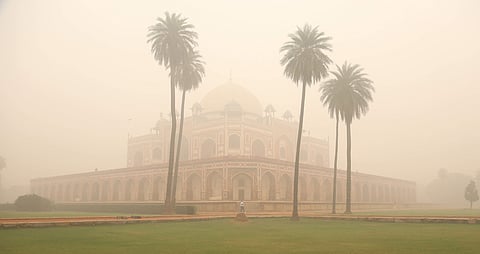 A thick blanket of smog covers Humayun's Tomb, as air quality dips to severe category in New Delhi on Sunday. (Photo | Arun Kumar, EPS)