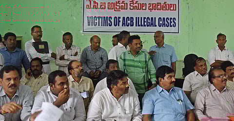 Victims of ACB illegal cases during a press conference at Press Club in Vijayawada on Sunday. (Photo | EPS)