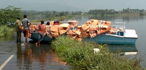 The Coimbatore district revenue department has brought a fiber boat to Lingapuram village, which is a place near the back water of Bhavani Sagar dam, where a connecting bridge for four villages has been submerged in the dam water, to facilitate the villag