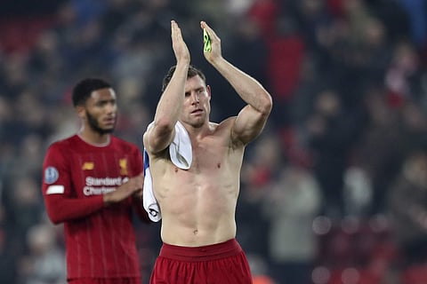 Liverpool's James Milner applauds the supporters at the end of the Champions League match against Genk at Anfield Stadium. (Photo | AP)