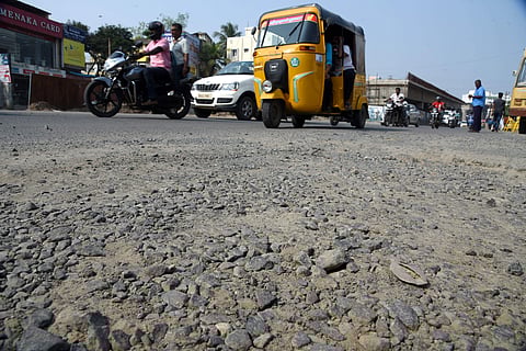 The stretch near Velachery main raoad filled with rubbles making it difficult for road users.  (Photo | EPS/ R Satish Babu)