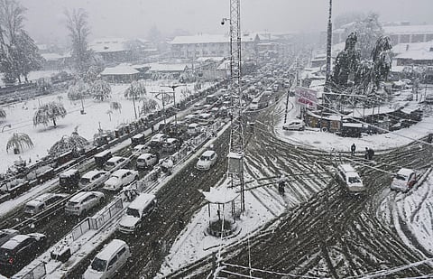 Kashmir valley received heavy snowfall which caused the closure of Srinagar-Jammu National Highway and disruption of air-traffic. (Photo | PTI)