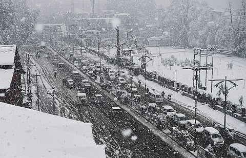 Kashmir valley received heavy snowfall which caused the closure of Srinagar-Jammu National Highway and disruption of air-traffic. (Photo| PTI)