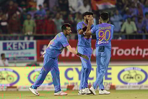 Indian players Yuzvendra Chahal, left, Khaleel Ahmed, center and Deepak Chahar celebrate the wicket of Bangladesh's captain Mahmudullah. (Photo | AP)