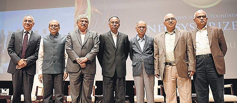 Trustees of Infosys N R Narayana Murthy (3rd from right) and Nandan Nilekani (3rd from left) with other trustees at the Infosys Science Foundation in Bengaluru on Thursday | | Meghana Sastry