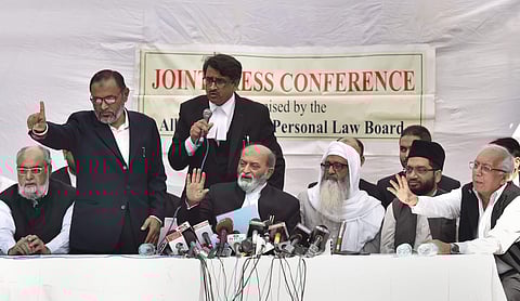 Sunni Central Waqf Board's lawyer Zafaryab Jilani along with other advocates and Muslim leaders addresses a press conference after the Supreme Court pronounces its verdict on Ayodhya land case in New Delhi Saturday. (Photo | PTI)