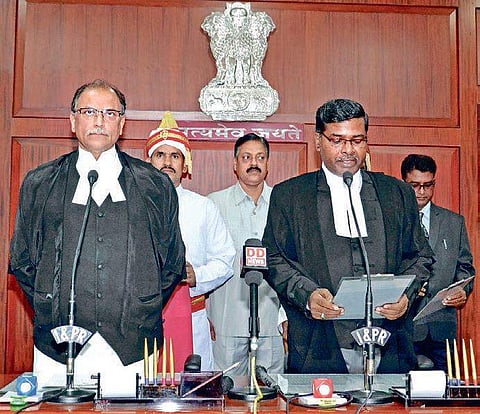 Chief Justice of Orissa High Court KS Jhaveri administering oath to Justice Bibhu Prasad Routray as a Judge of the HC in Cuttack on  Friday | express
