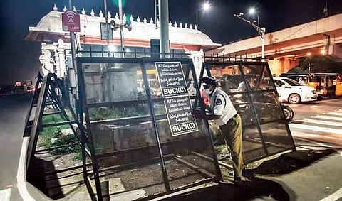 Barricades being erected on Friday on the eve of the  ‘Chalo Tank Bund’ protest in Hyderabad by the TSRTC employees. (Photo | EPS, Vinay Madapu)