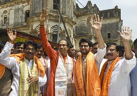 Shiv Sena chief Uddhav Thackeray (L), Yuva Sena chief Aaditya Thackeray and senior party leader Sanjay Raut (R). | (File | PTI)
