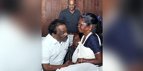 Minister AK Balan interacts with members of Paniya community from Wayanad, at the IFFK in Thiruvananthapuram. (Photo | Vincent Pulickal, EPS)
