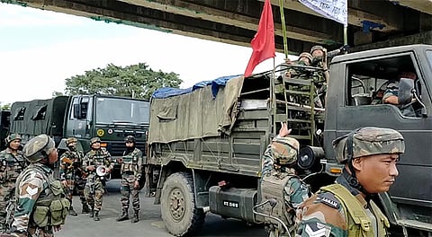 Security personnel fire in the air after the situation turned volatile when students clashed with security forces during their protest march against the Citizenship Amendment Bill at Bokel in Dibrugarh Wednesday Dec. 11 2019. (Photo | TV Screengrab)
