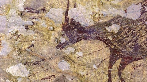 An image released by Griffith University on Wednesday shows Indonesian cave art dating back at least 43,900 years [Ratno Sardi/ Griffith University/AFP]