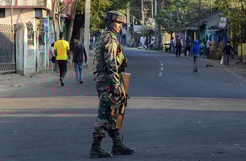 An Army jawan stands guard in a locality during relaxation of curfew in Dibrugarh Friday Dec. 13 2019. (Photo | PTI)
