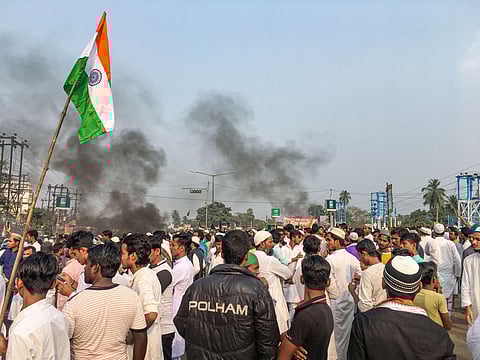 Muslim community members block the National Highway 6 during a protest against NRC and the Citizenship Amendment Bill in West Bengal s Uluberia district Friday Dec. 13 2019. | (Photo | PTI)