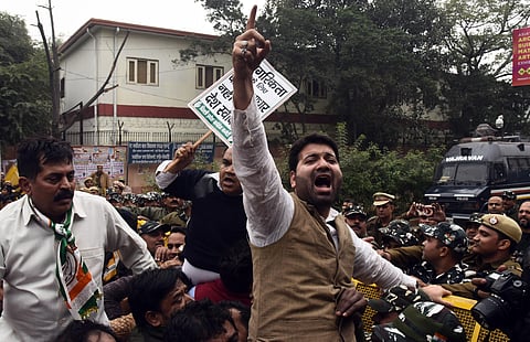People shouting slogan against Citizenship Amendment Bill outside BJP Headquarte in New Delhi on Wednesday. (Photo | Parveen Negi, EPS)