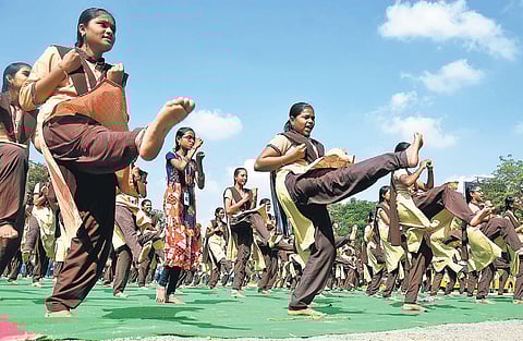 Students performing martial arts during Mission Sahasi organised by ABVP at Government music college in Vijayawada on Thursday. (Photo | P Ravindra Babu)