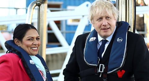 Britain's Prime Minister Boris Johnson and Home Secretary Priti Patel (Photo | AP)