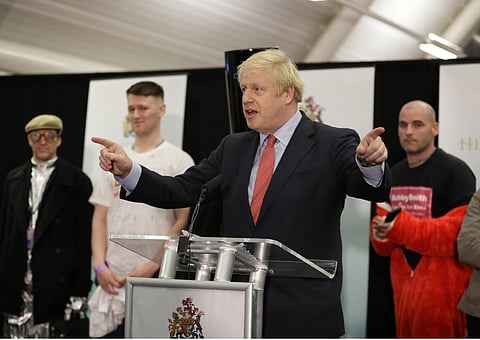 Britain's Prime Minister and Conservative Party leader Boris Johnson gestures as he speaks after the Uxbridge and South Ruislip constituency count declaration at Brunel University in Uxbridge, London, Friday, Dec. 13, 2019. (Photo | AP)