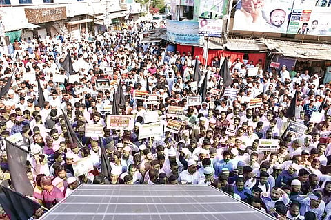 Activists protest at Muslim Chowk in Kalaburagi on Friday | express