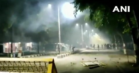 Clashes erupted between students and cops outside Aligarh Muslim University. (Photo | ANI screengrab)